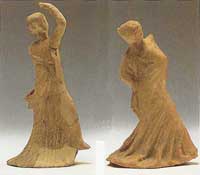 Ancient greek terracotta figures of two dancers